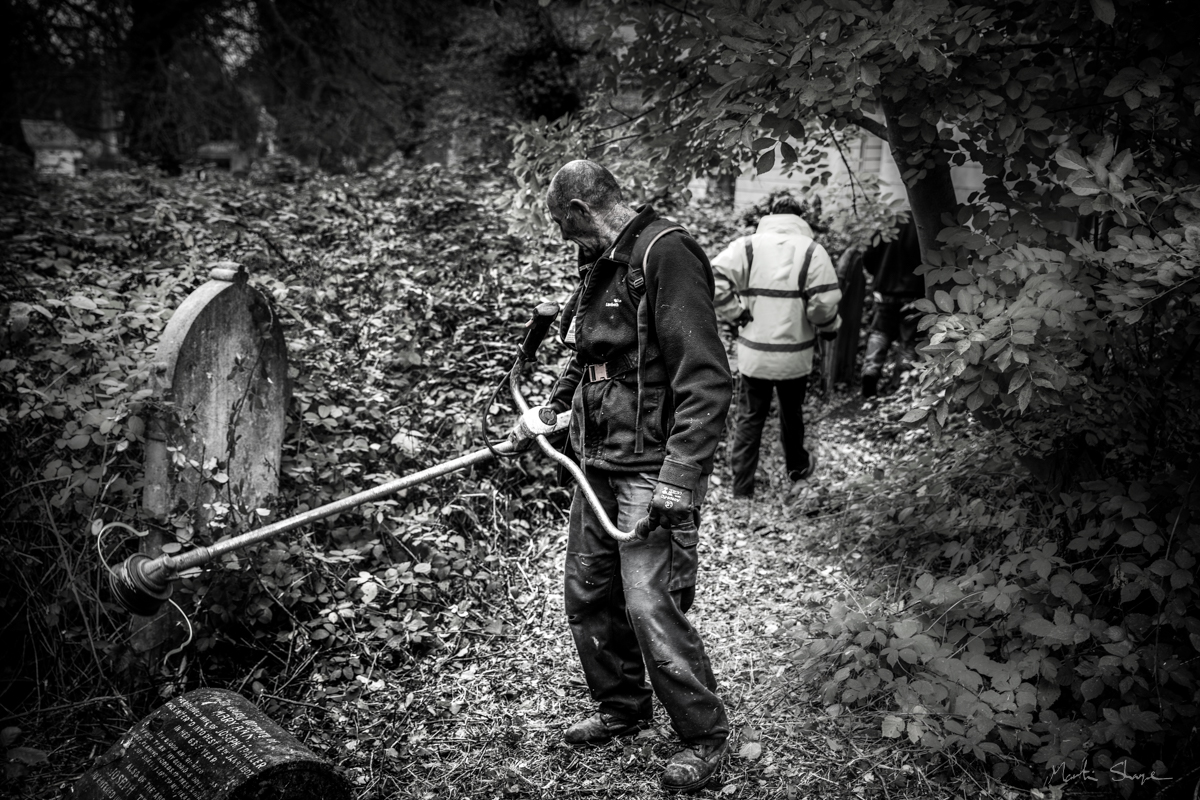 Workman with strimmer parody of The Grim Reaper